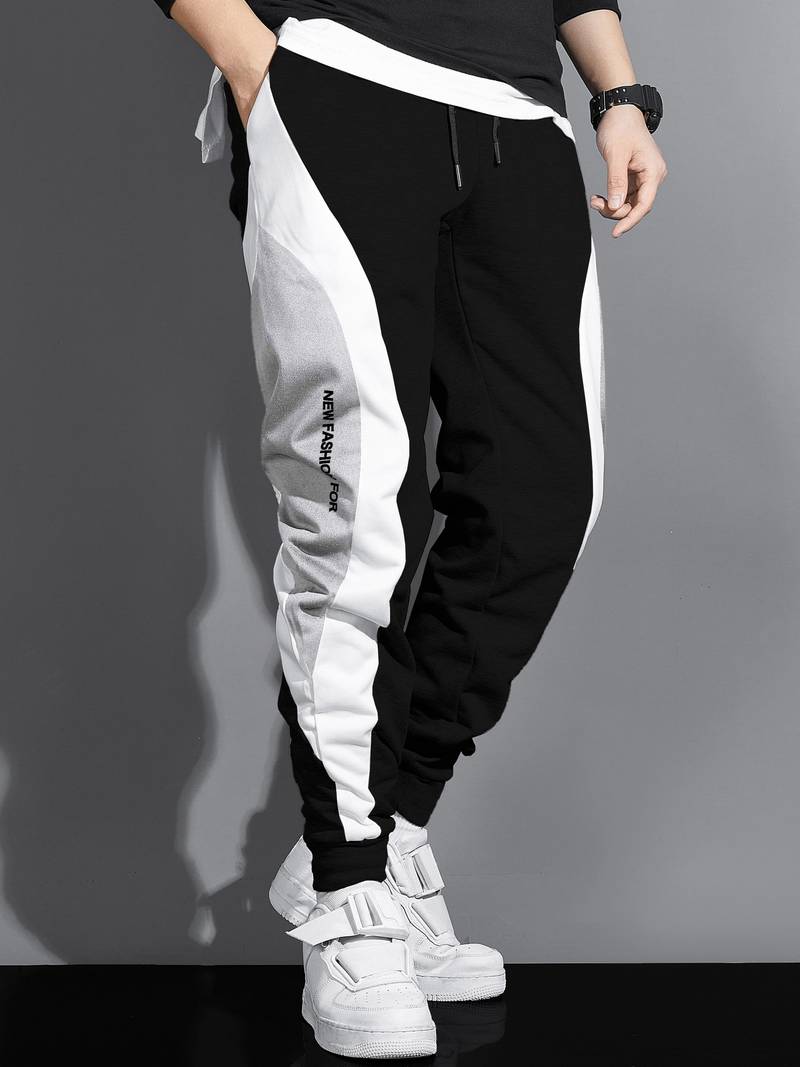 Herr sweatpants med dragsko – trendiga joggingsbyxor med sidopaneler och fickor