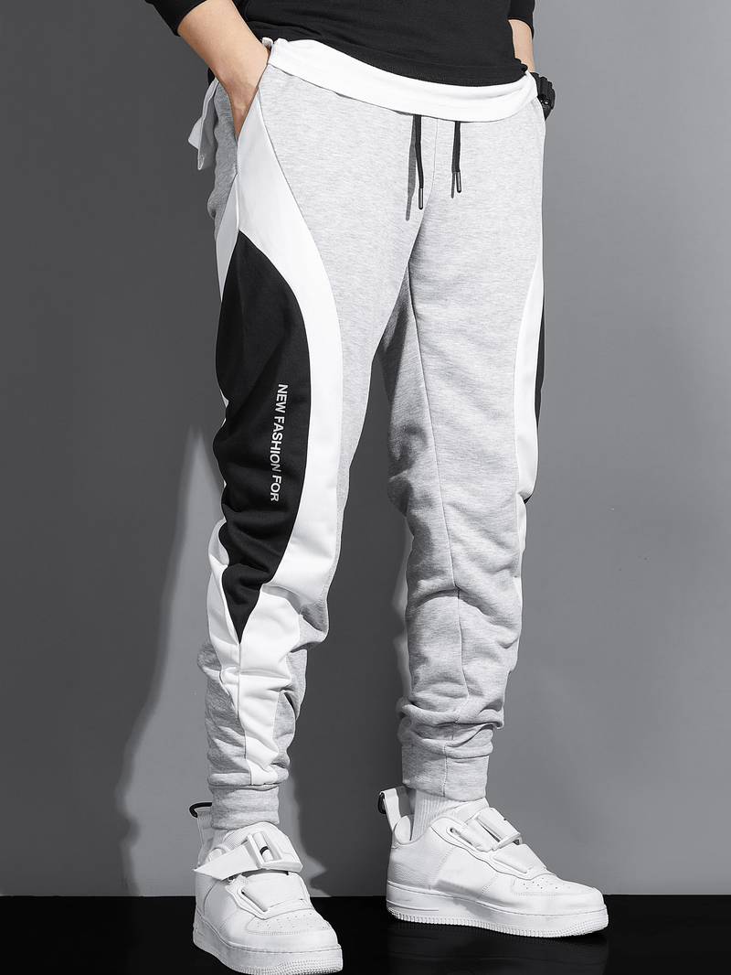 Herr sweatpants med dragsko – trendiga joggingsbyxor med sidopaneler och fickor