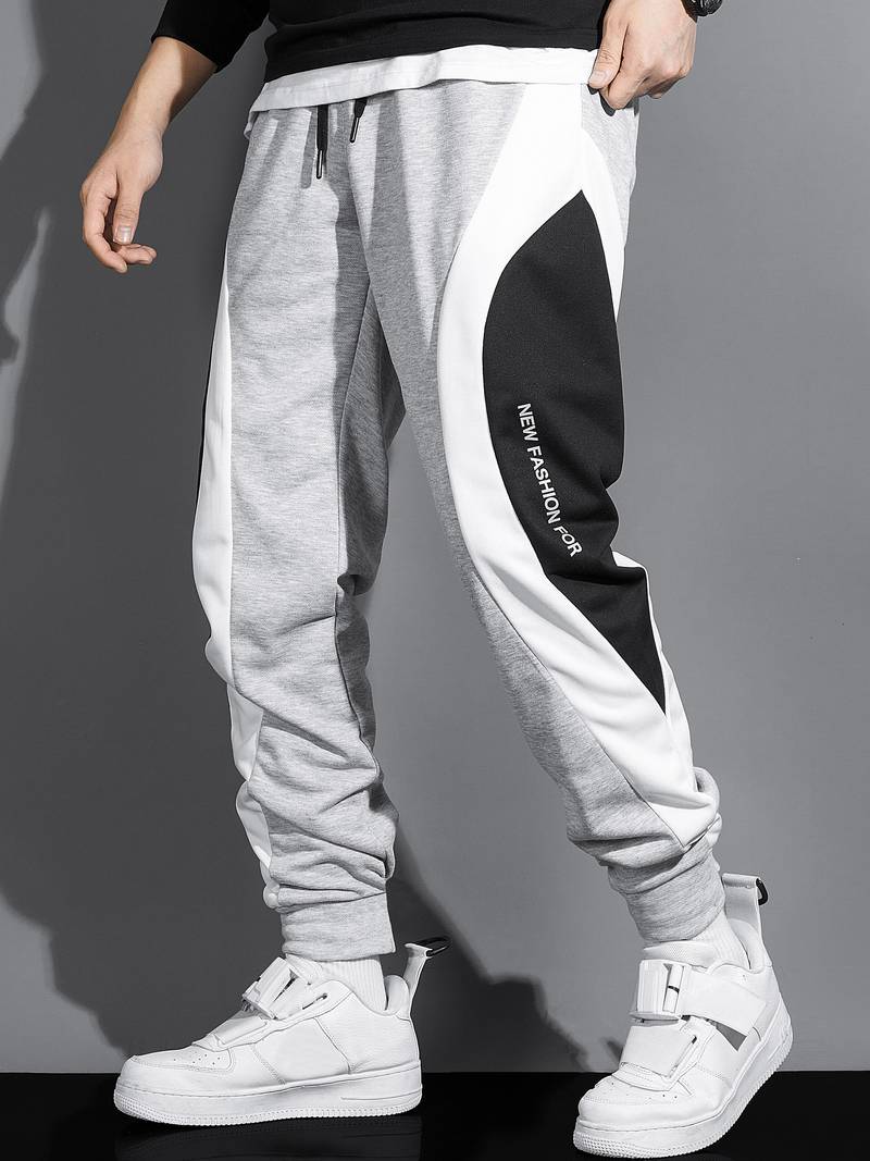 Herr sweatpants med dragsko – trendiga joggingsbyxor med sidopaneler och fickor